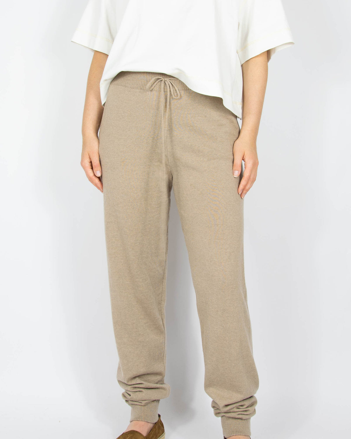 Beige merino wool sweatpants by SKAPPEL.