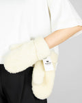 Cream wool gloves by ALWERO.