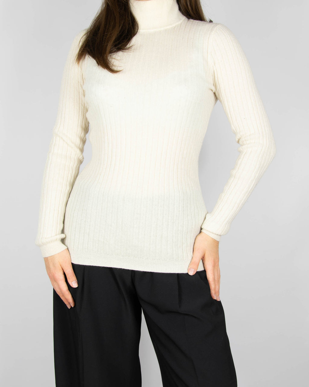 Cream cashmere turtleneck sweater by Scandinavian premium brand Gerts Oslo Cashmere.