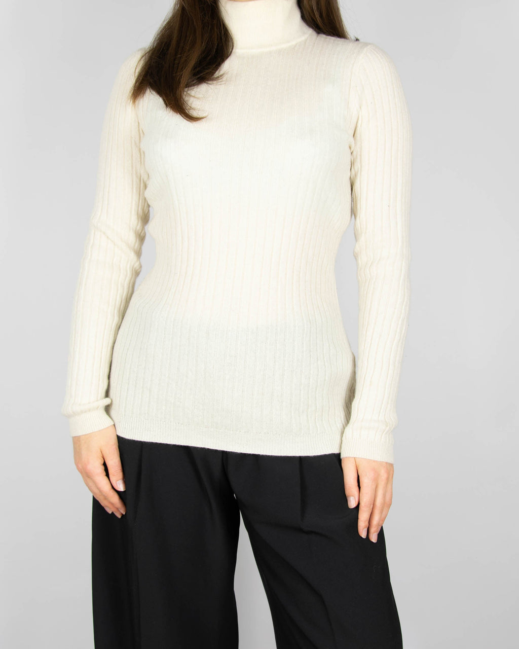Cream cashmere turtleneck sweater by Scandinavian premium brand Gerts Oslo Cashmere.