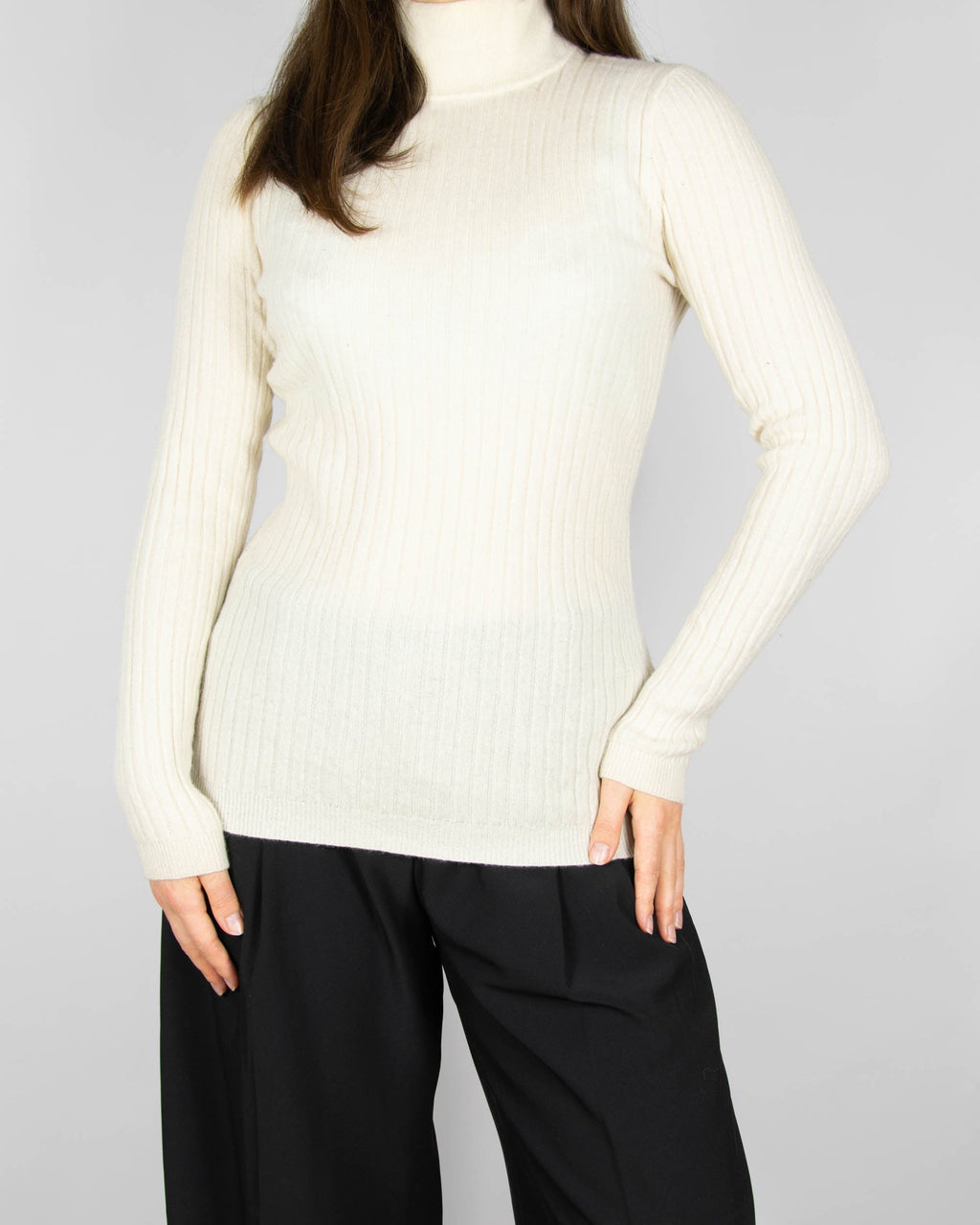 Cream cashmere turtleneck sweater by Scandinavian premium brand Gerts Oslo Cashmere.