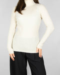 Cream cashmere turtleneck sweater by Scandinavian premium brand Gerts Oslo Cashmere.