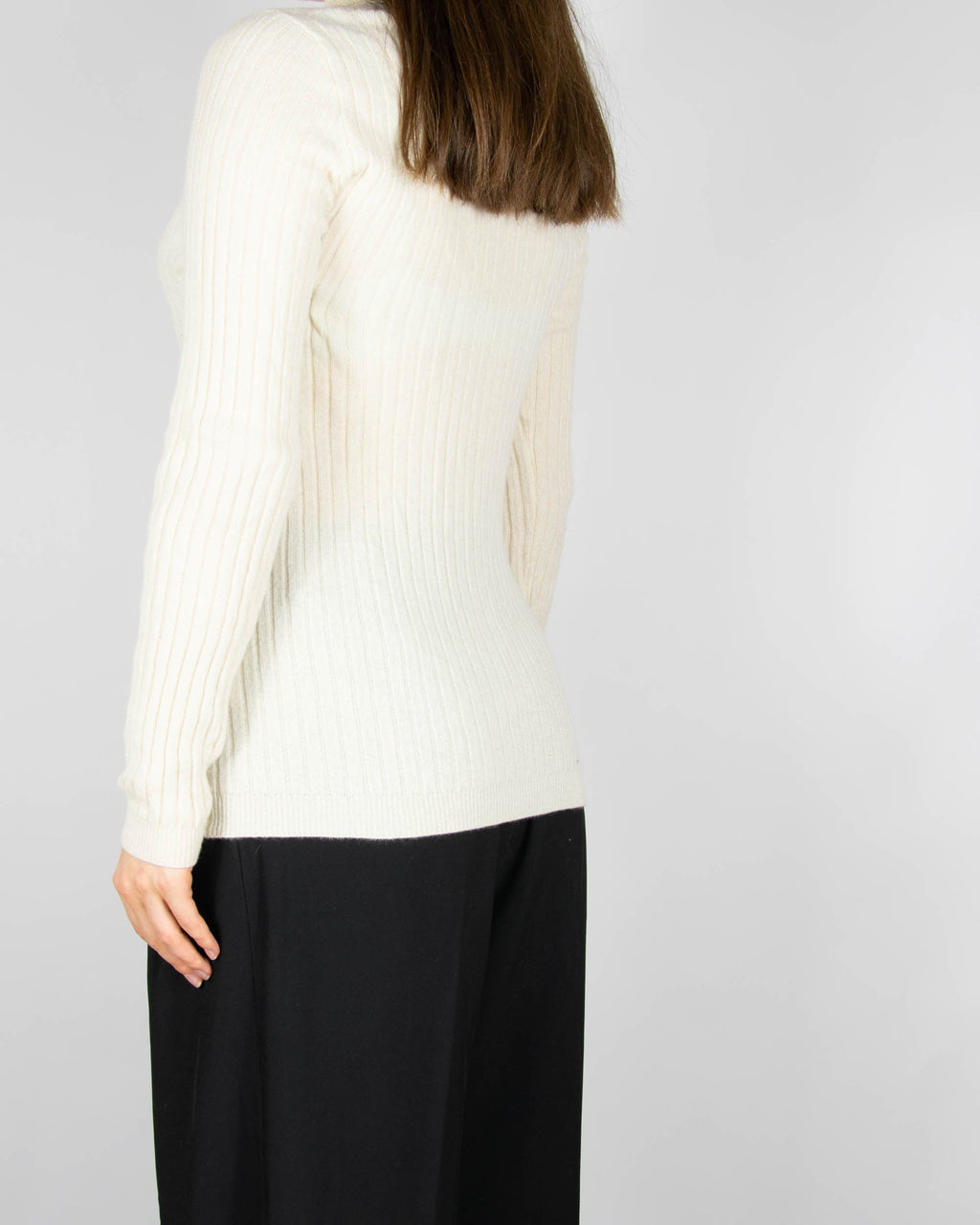 Cream cashmere turtleneck sweater by Scandinavian premium brand Gerts Oslo Cashmere.