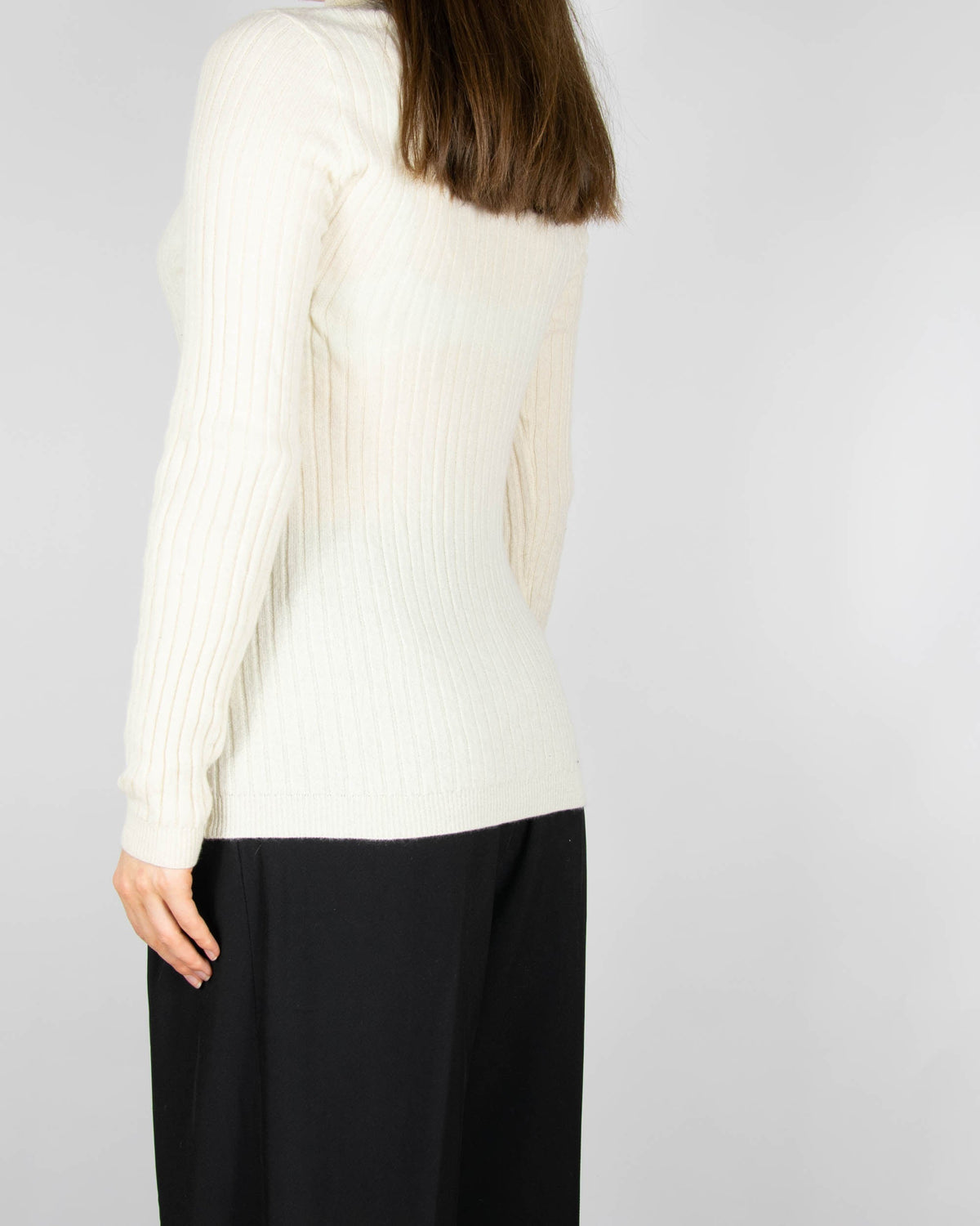 Cream cashmere turtleneck sweater by Scandinavian premium brand Gerts Oslo Cashmere.