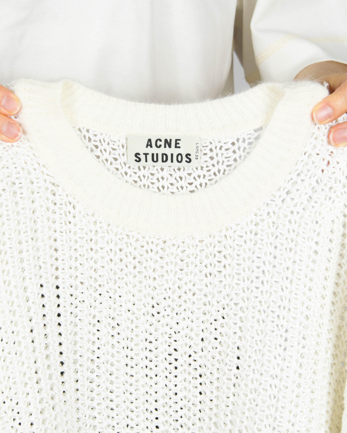 White linen and angora sweater by premium brand Acne Studios.