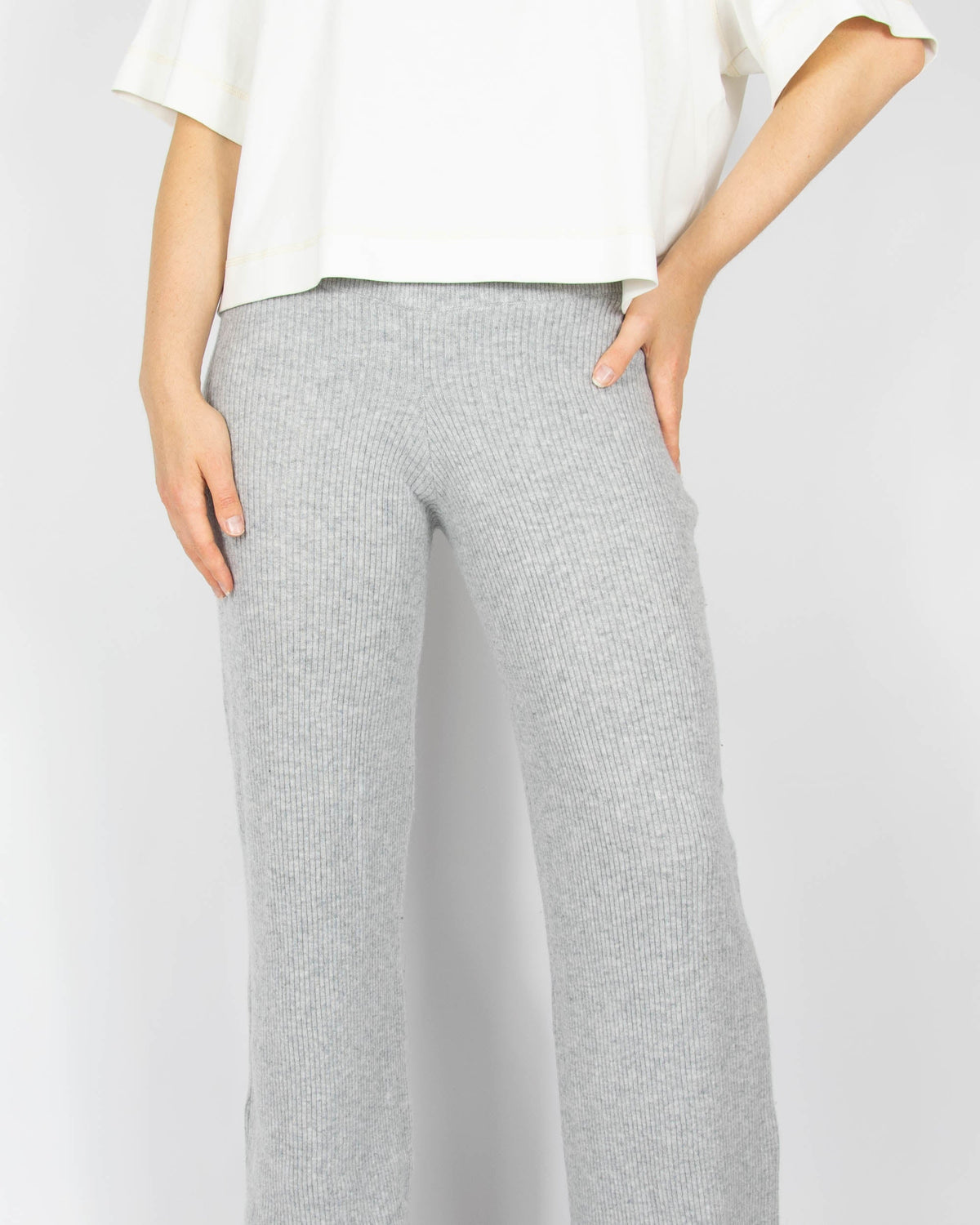 Grey ribbed wide-leg trousers made from wool and cashmere by premium brand Ella & Il. Soft and very pleasant to the touch. The trousers are long and will work especially well for a