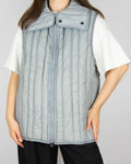 Grey down vest by premium brand Holzweiler. The regular price is €300 (~1300 PLN).