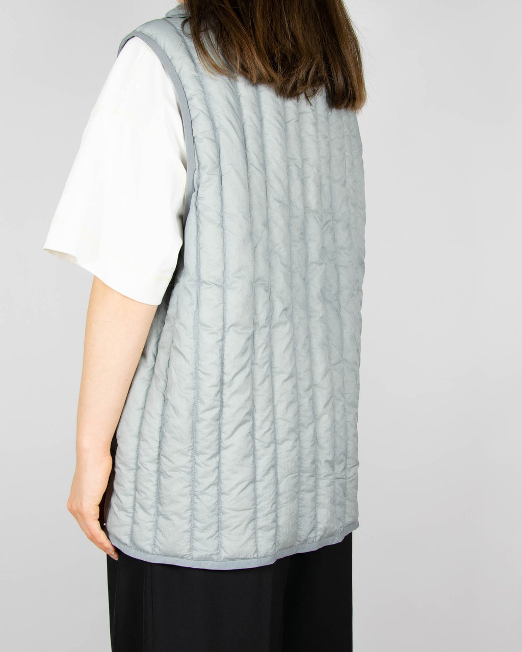 Grey down vest by premium brand Holzweiler. The regular price is €300 (~1300 PLN).