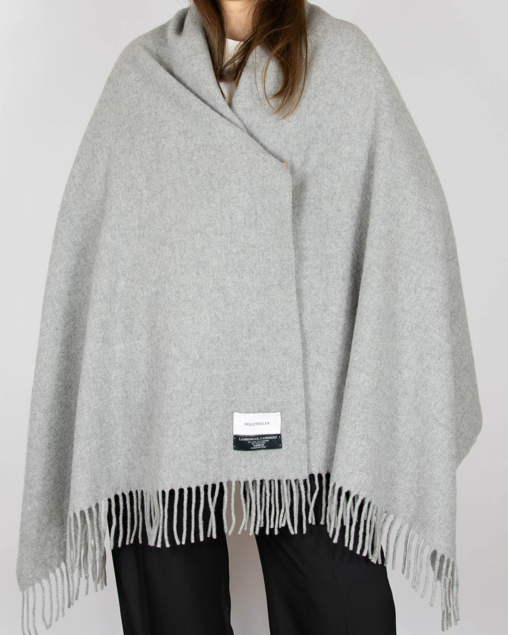 Large, cosy grey lambswool and cashmere scarf by Norwegian designer brand Holzweiler. Made in Italy.