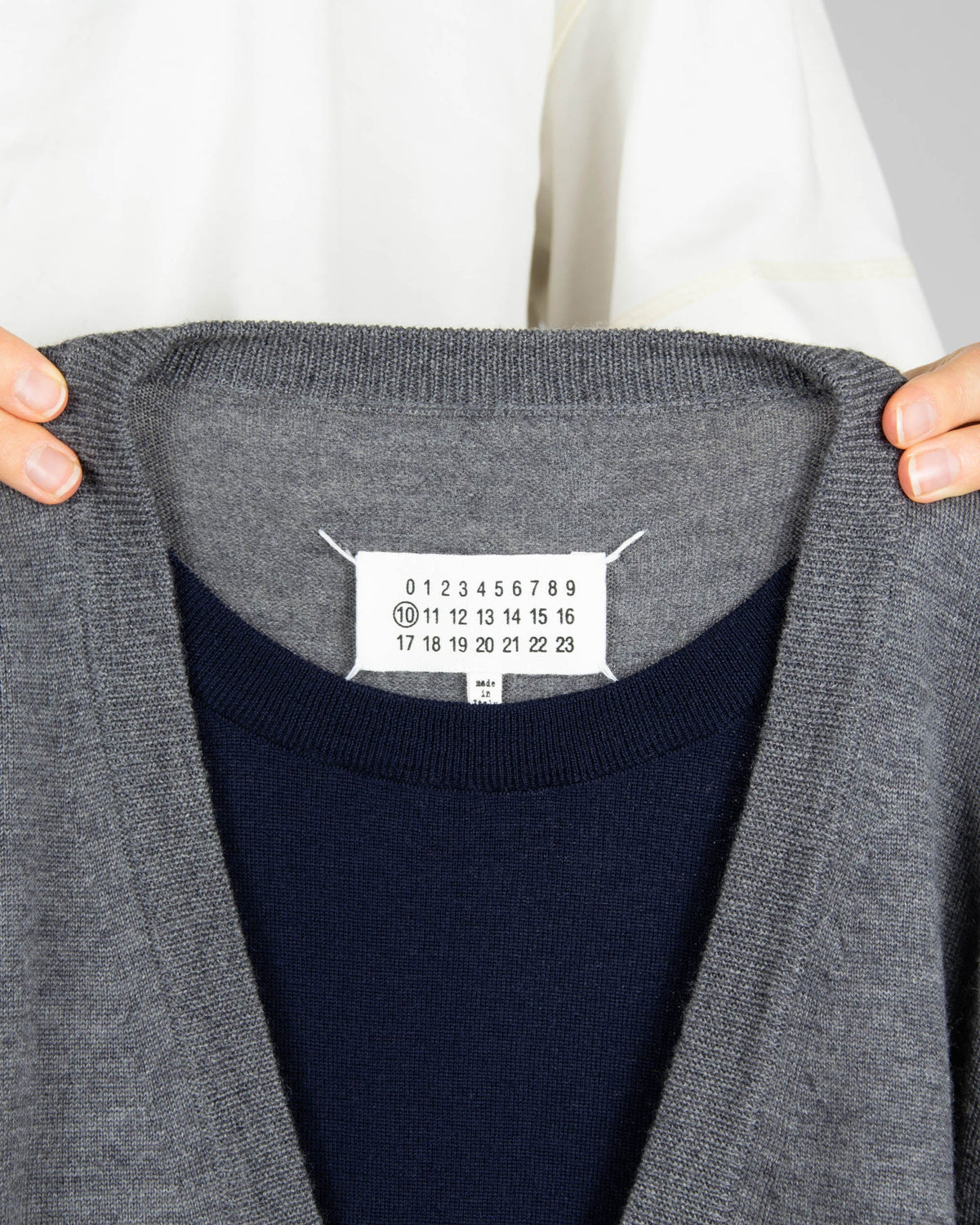 Grey and navy wool cardigan by luxury brand Maison Margiela