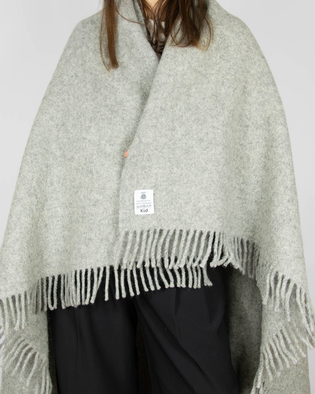 Grey pure new wool blanket by KID. Woolmark-certified. Washed and ready to keep you warm on cold evenings.
