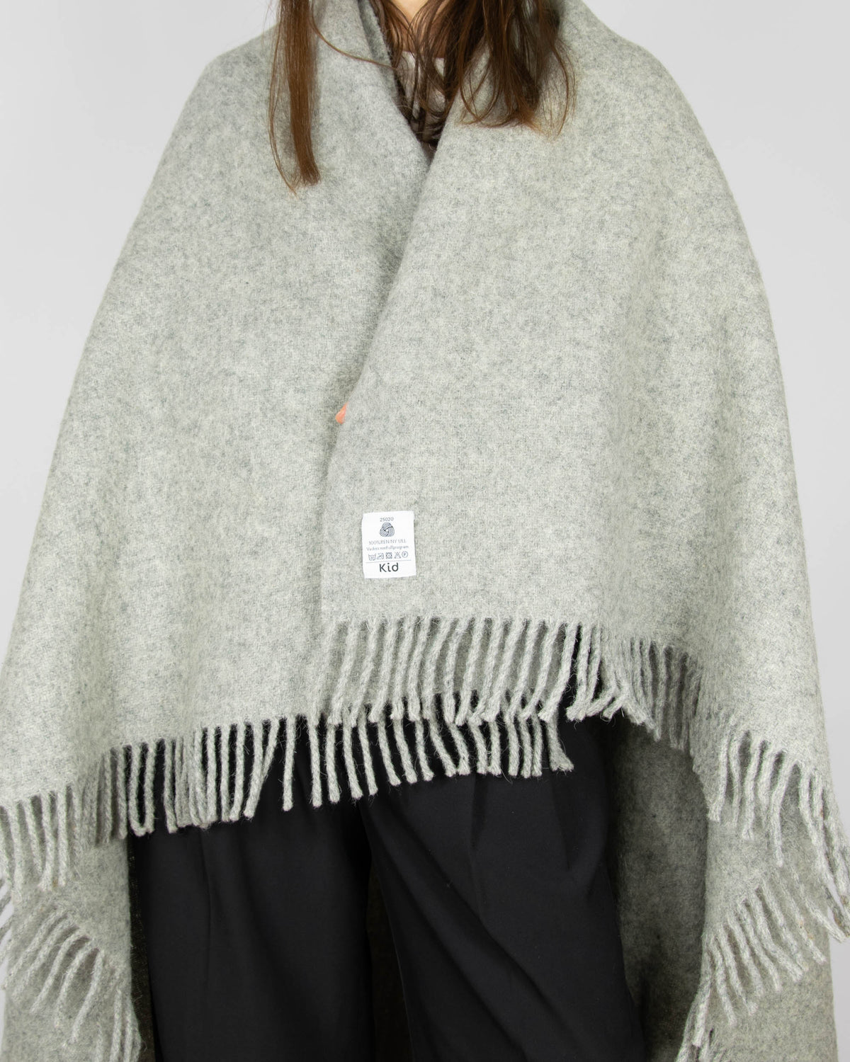 Grey pure new wool blanket by KID. Woolmark-certified. Washed and ready to keep you warm on cold evenings.