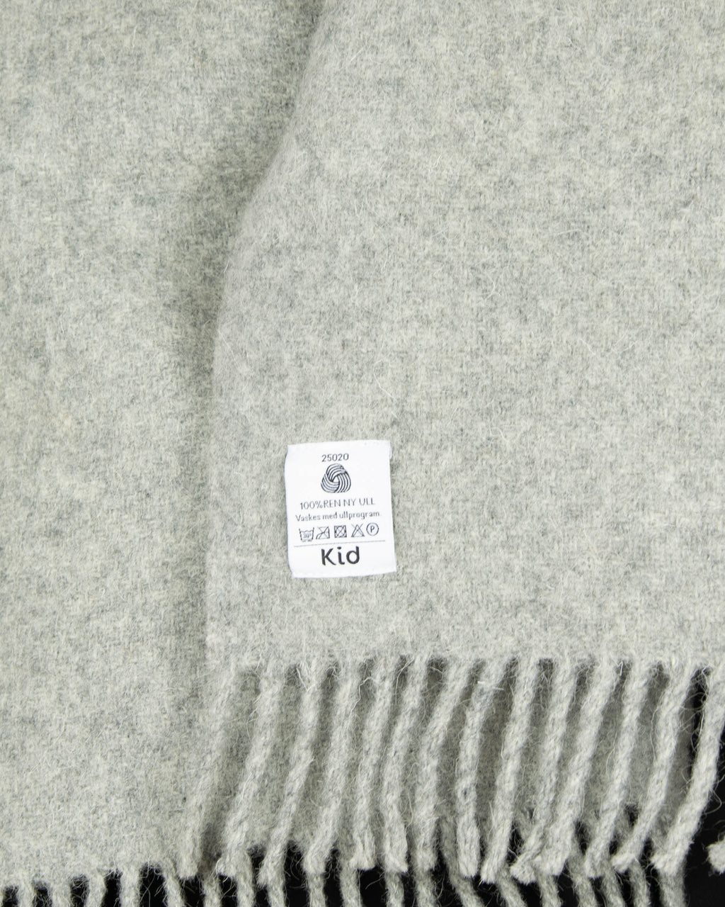 Grey pure new wool blanket by KID. Woolmark-certified. Washed and ready to keep you warm on cold evenings.