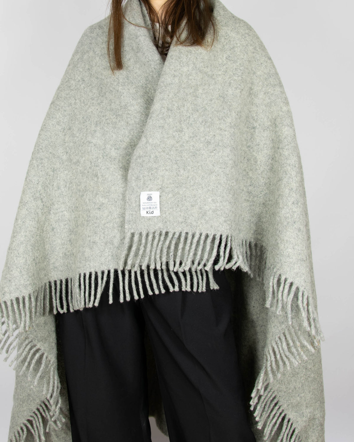 Grey pure new wool blanket by KID. Woolmark-certified. Washed and ready to keep you warm on cold evenings.