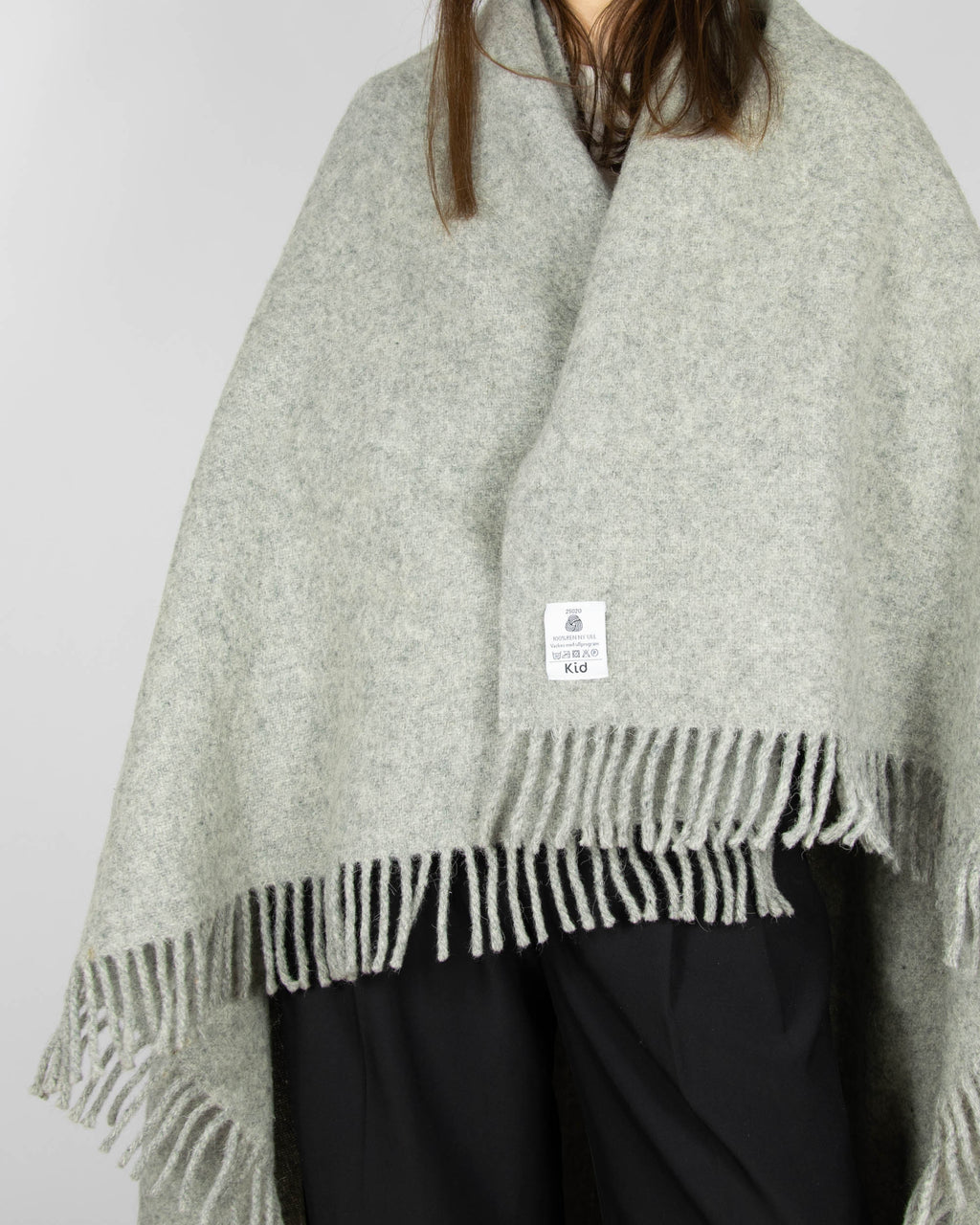 Grey pure new wool blanket by KID. Woolmark-certified. Washed and ready to keep you warm on cold evenings.