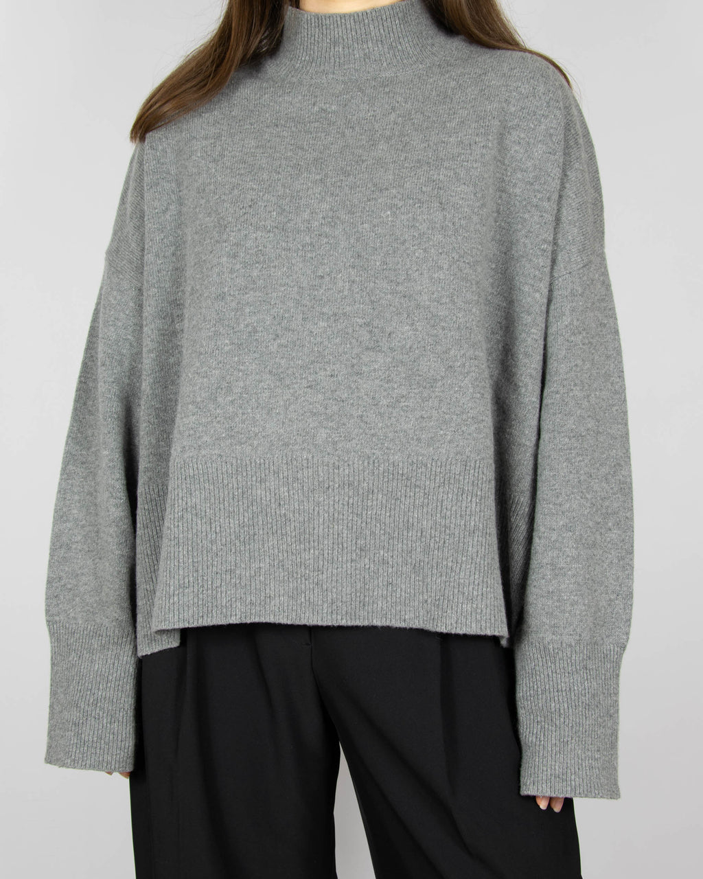 Grey wool turtleneck sweater by premium brand Arnie Says. Made in Italy.