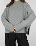 Grey wool turtleneck sweater by premium brand Arnie Says. Made in Italy.