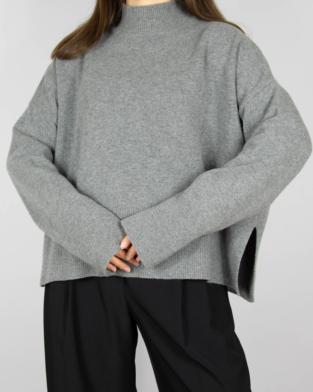 Grey wool turtleneck sweater by premium brand Arnie Says. Made in Italy.
