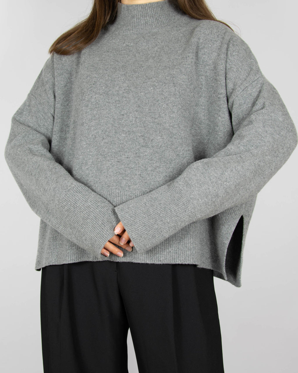 Grey wool turtleneck sweater by premium brand Arnie Says. Made in Italy.