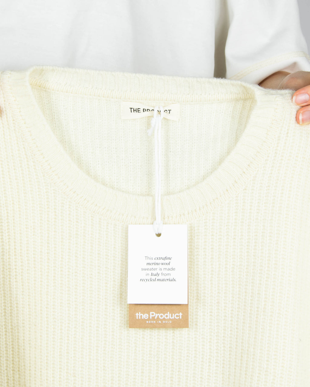 Cream extrafine merino wool sweater by Norwegian brand THE PRODUCT. Regular price: 2300 NOK (~970 PLN).