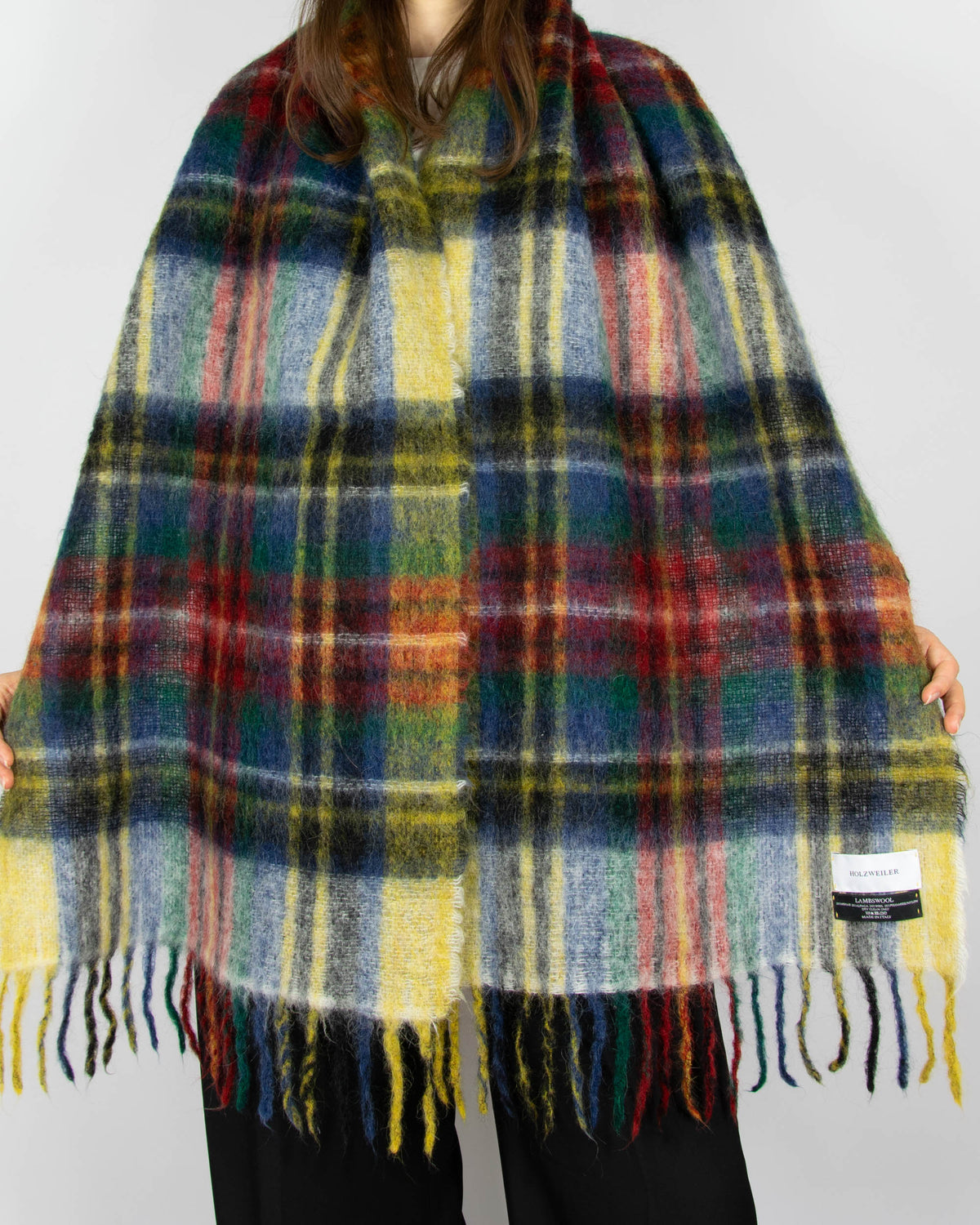 Multicoloured scarf made from mohair, alpaca and wool by Norwegian designer brand Holzweiler. Made in Italy.