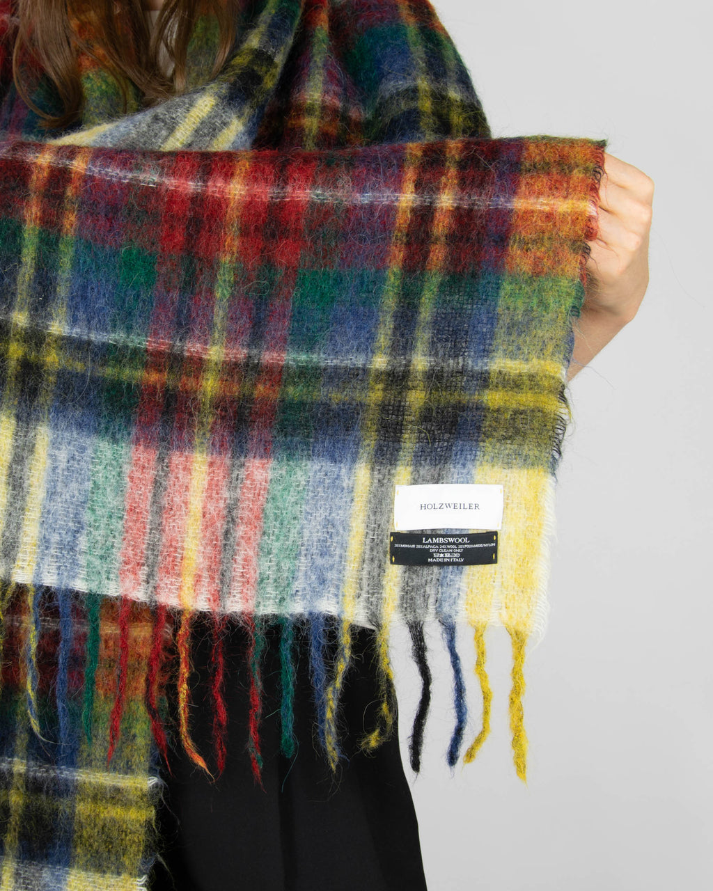 Multicoloured scarf made from mohair, alpaca and wool by Norwegian designer brand Holzweiler. Made in Italy.
