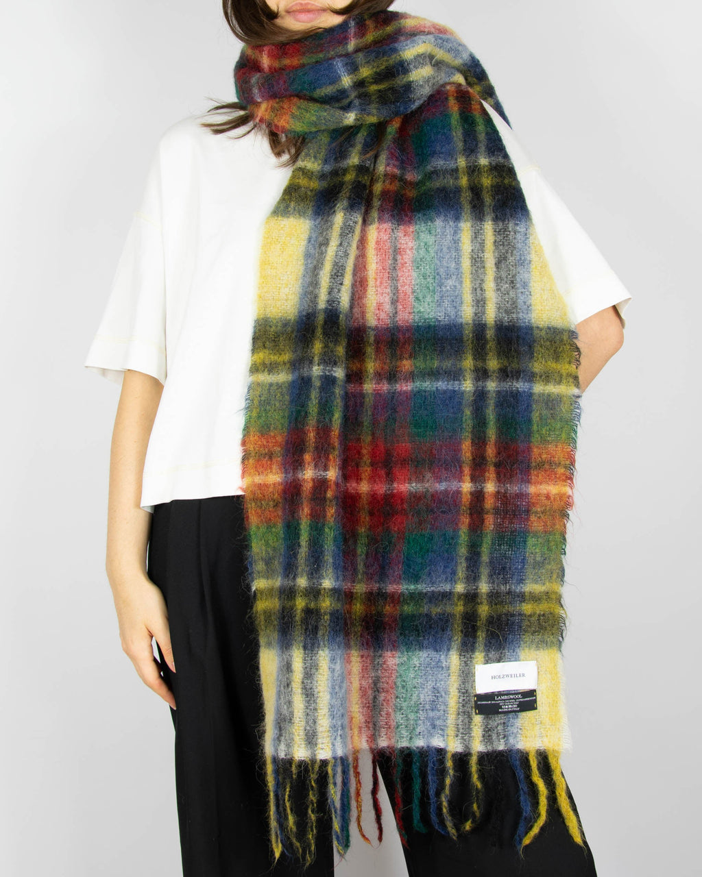 Multicoloured scarf made from mohair, alpaca and wool by Norwegian designer brand Holzweiler. Made in Italy.