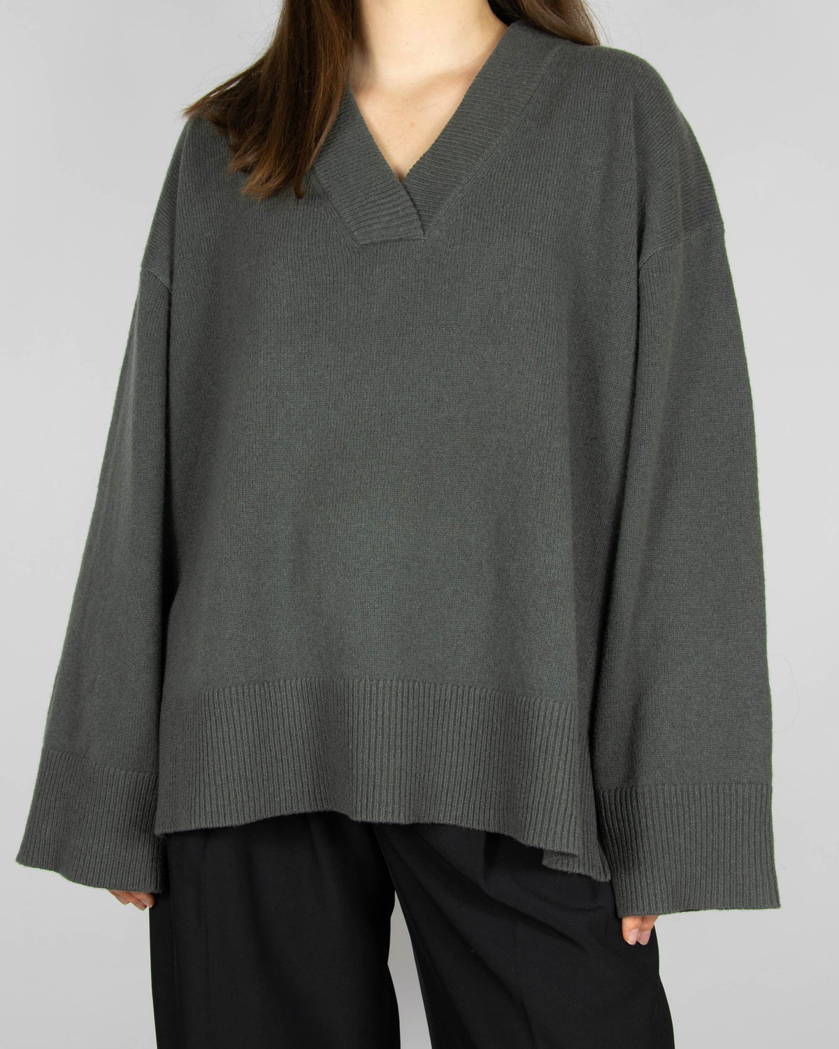 Grey-green merino wool sweater by Scandinavian brand Blu.