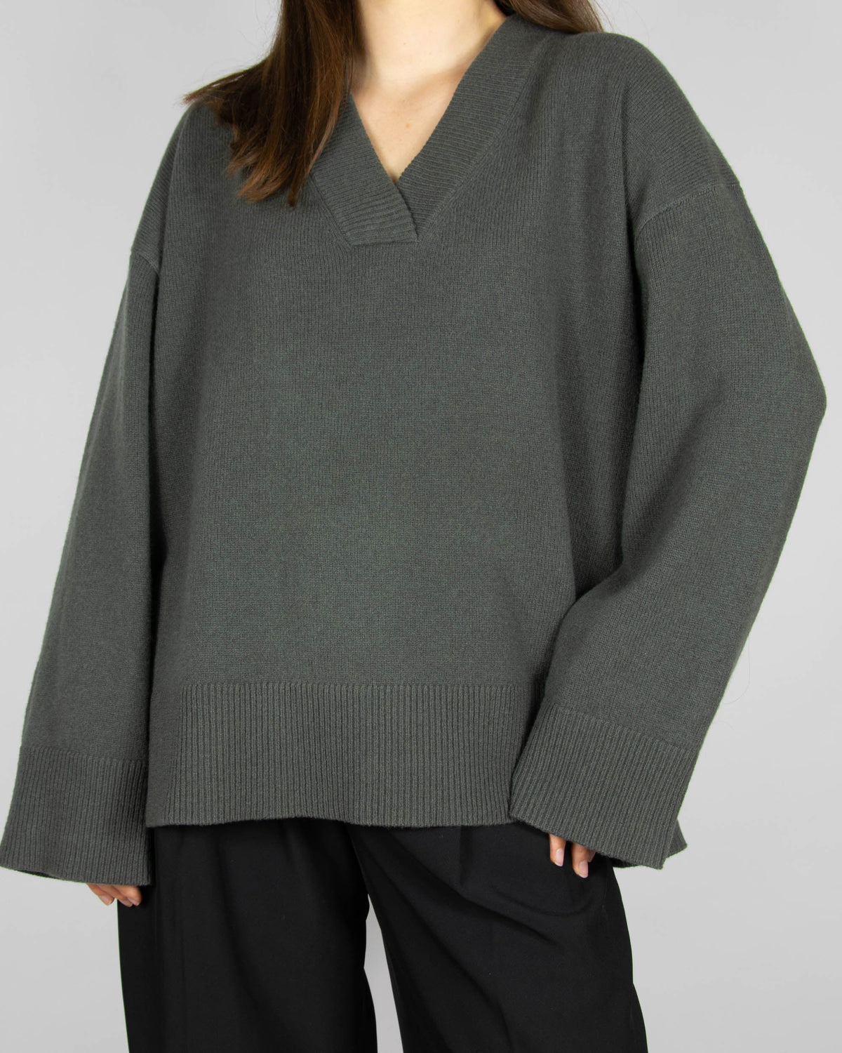 Grey-green merino wool sweater by Scandinavian brand Blu.