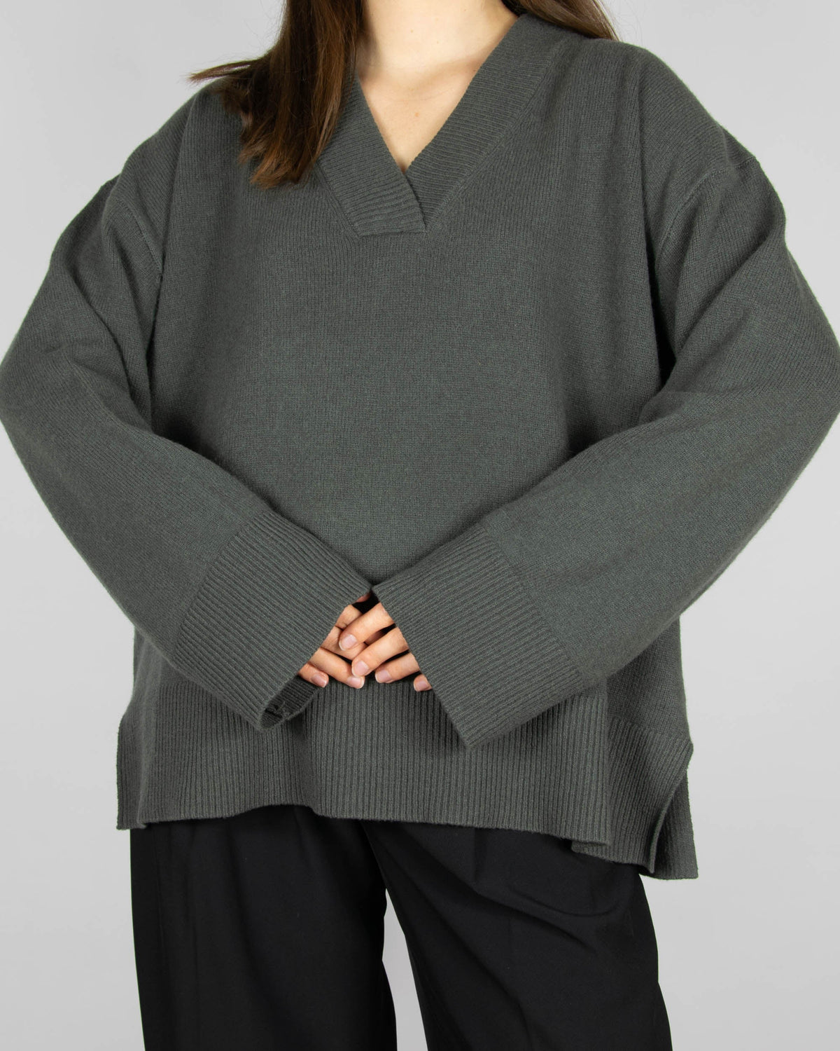 Grey-green merino wool sweater by Scandinavian brand Blu.