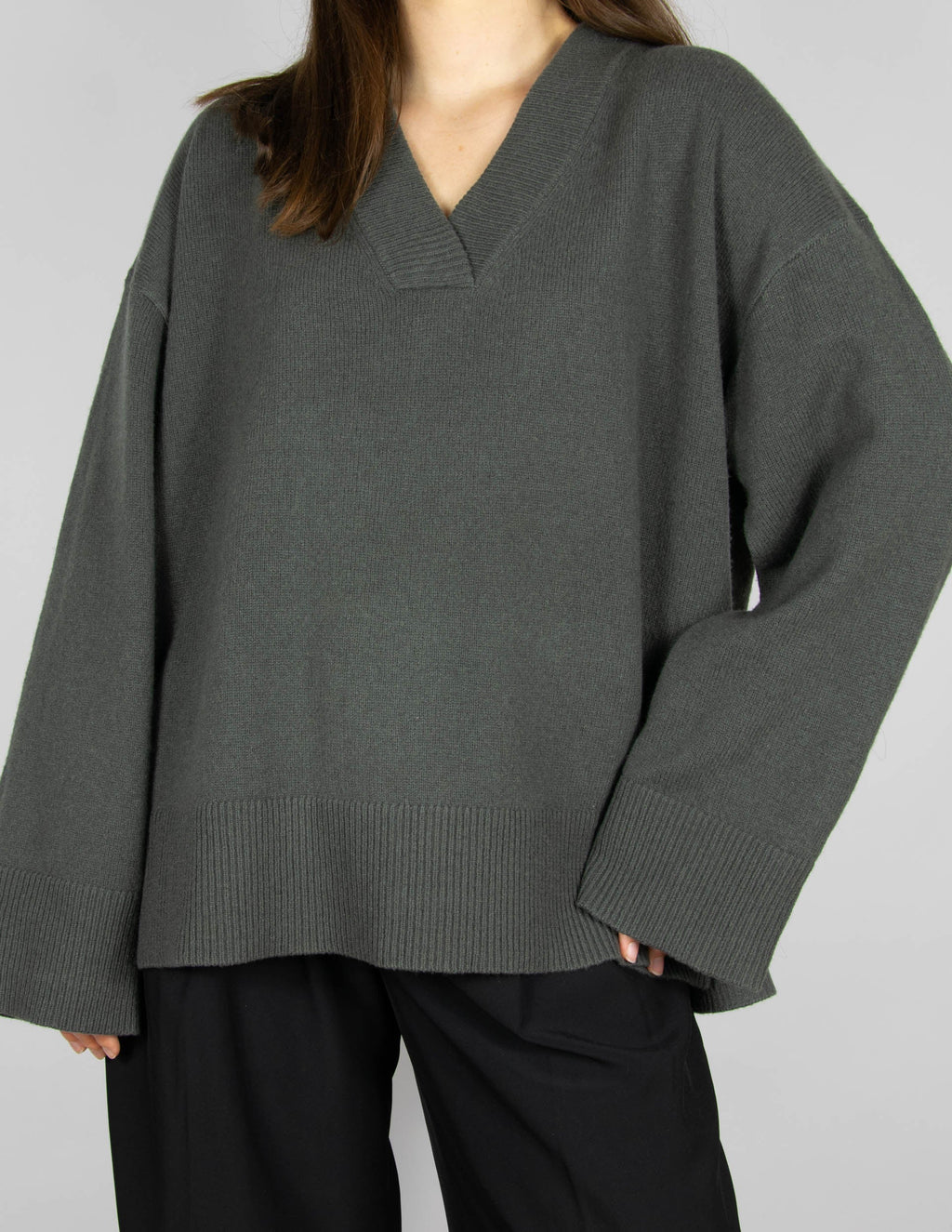 Grey-green merino wool sweater by Scandinavian brand Blu.