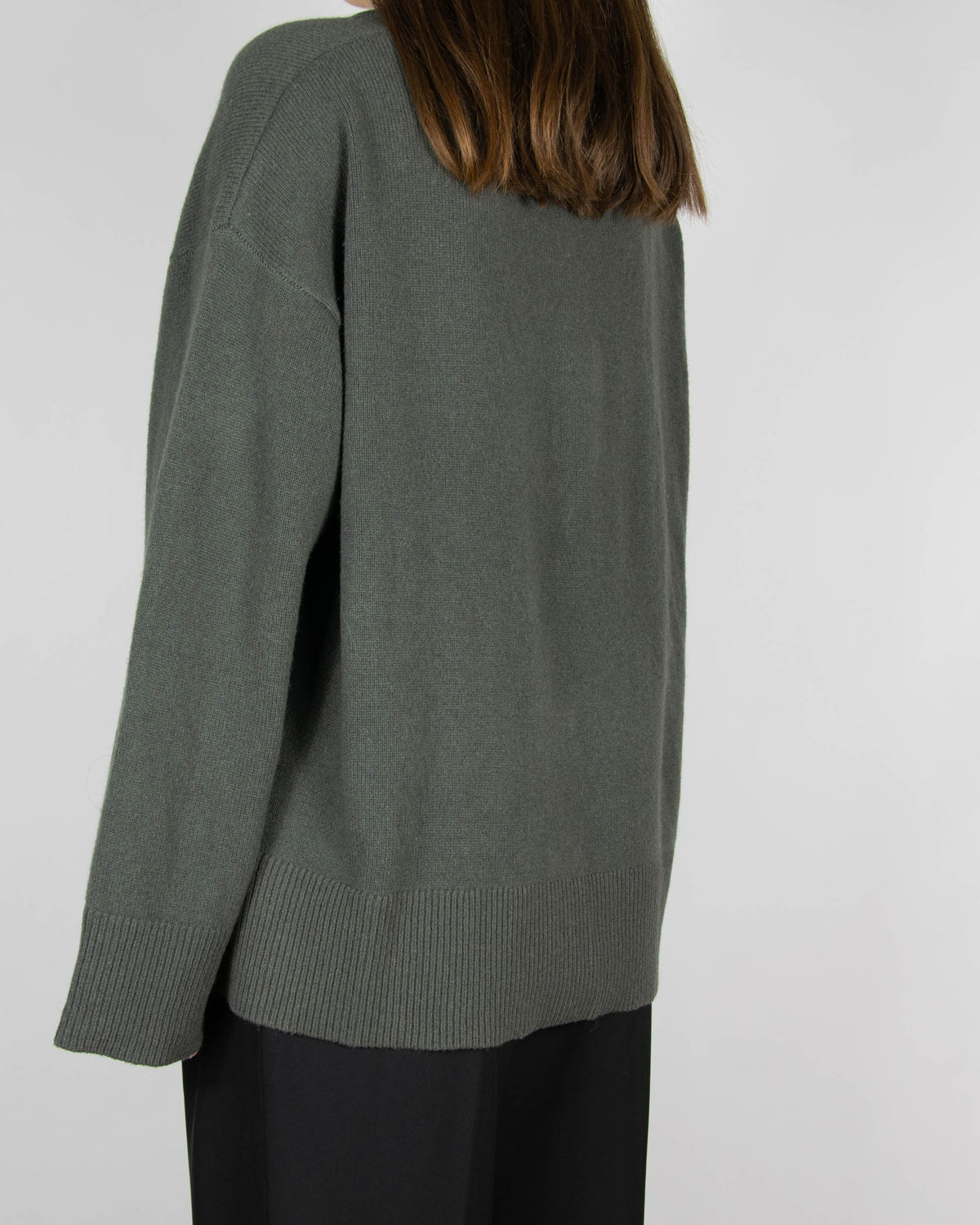 Grey-green merino wool sweater by Scandinavian brand Blu.