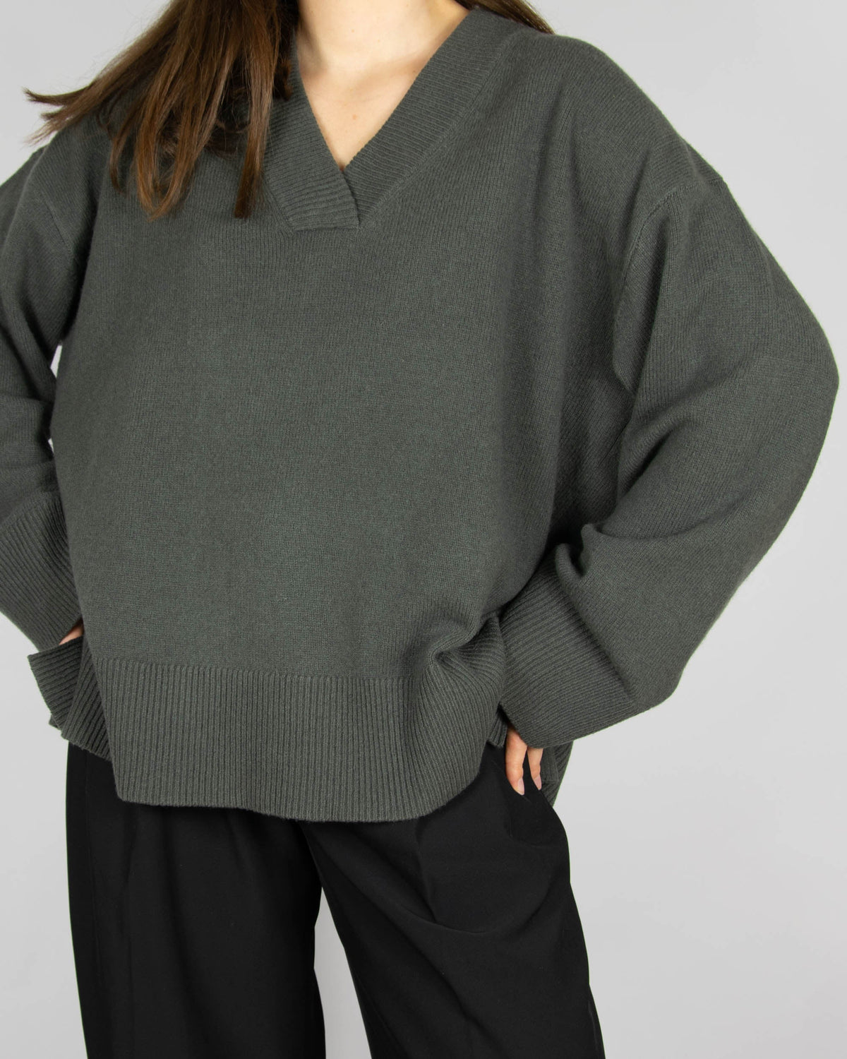 Grey-green merino wool sweater by Scandinavian brand Blu.