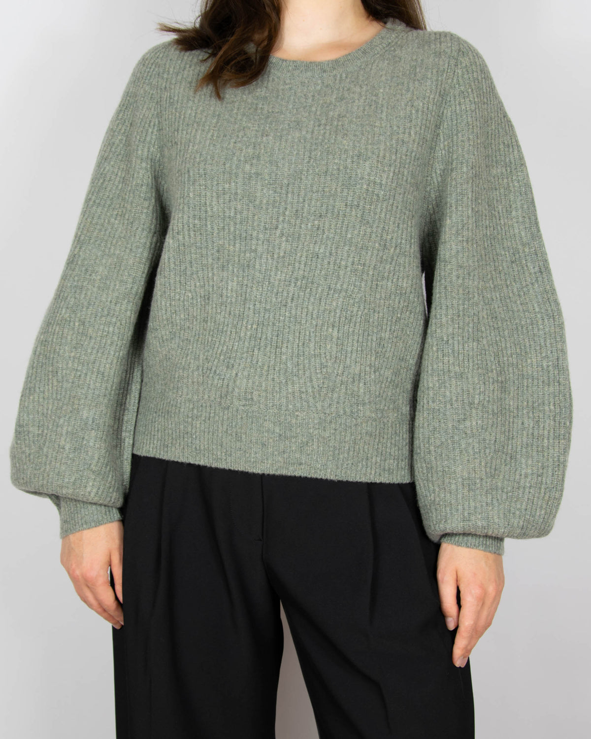 Green wool sweater with puff sleeves by Uniqlo