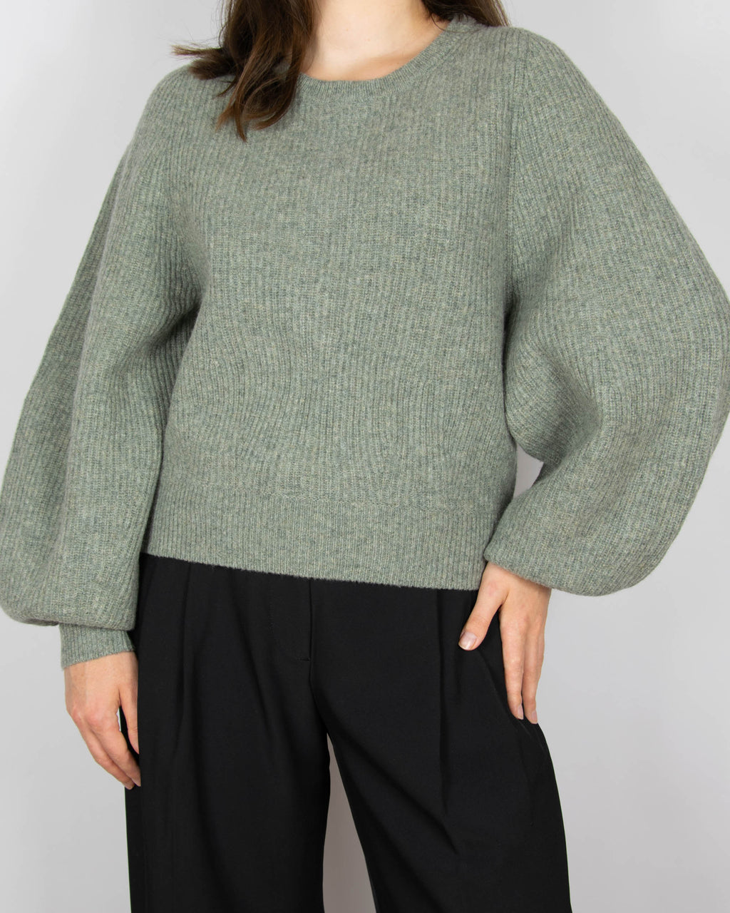 Green wool sweater with puff sleeves by Uniqlo