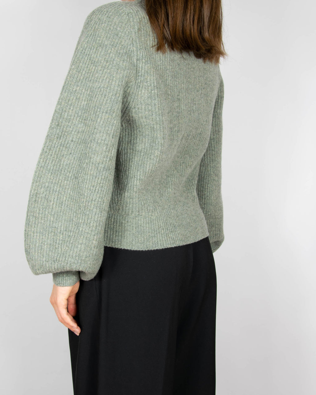 Green wool sweater with puff sleeves by Uniqlo