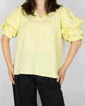 Lemon yellow linen blouse by LINE OF OSLO